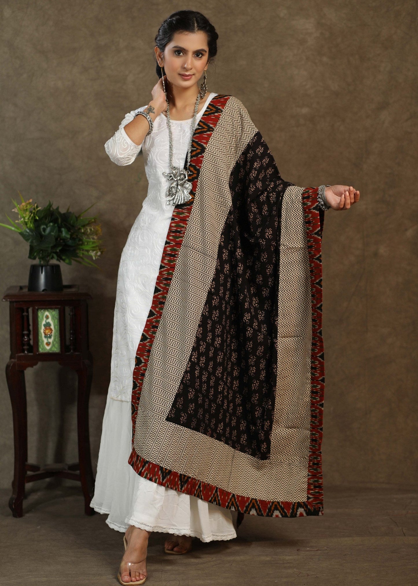 Beautiful black Ajrakh dupatta with multicolor Ikkat border