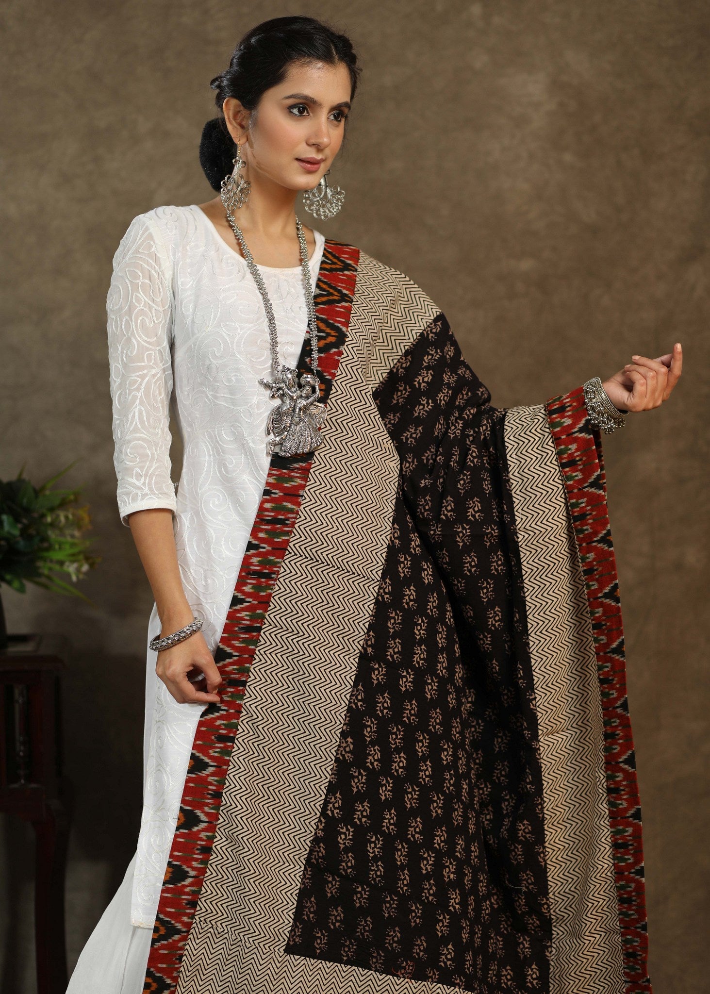 Beautiful black Ajrakh dupatta with multicolor Ikkat border