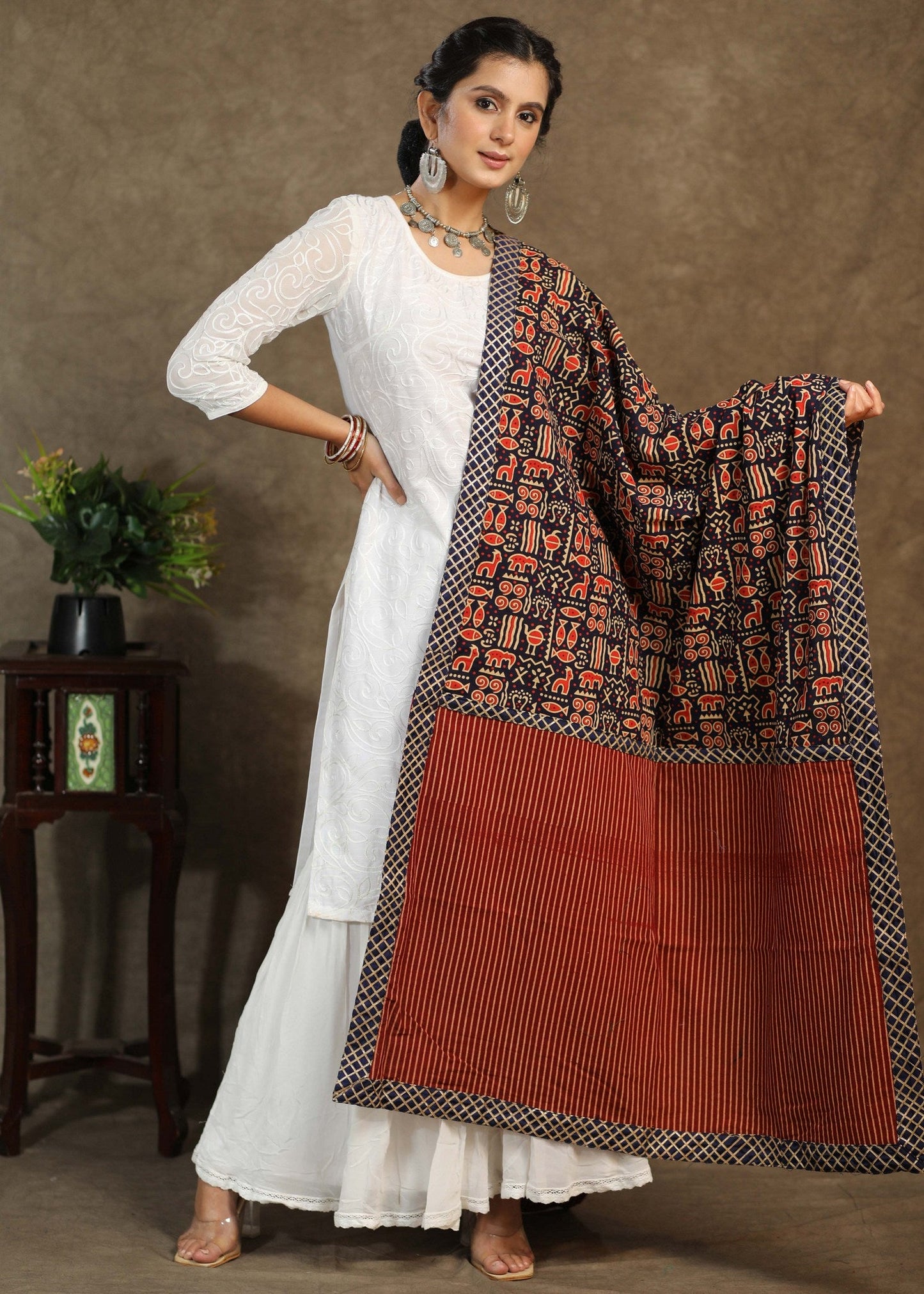 Classy animal print dupatta with Ajrakh combination and blue border