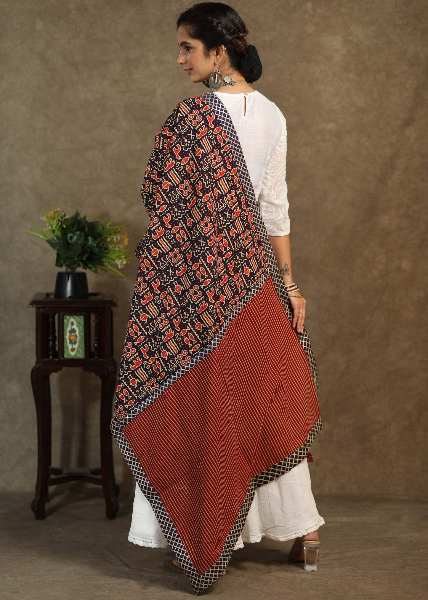 Classy animal print dupatta with Ajrakh combination and blue border