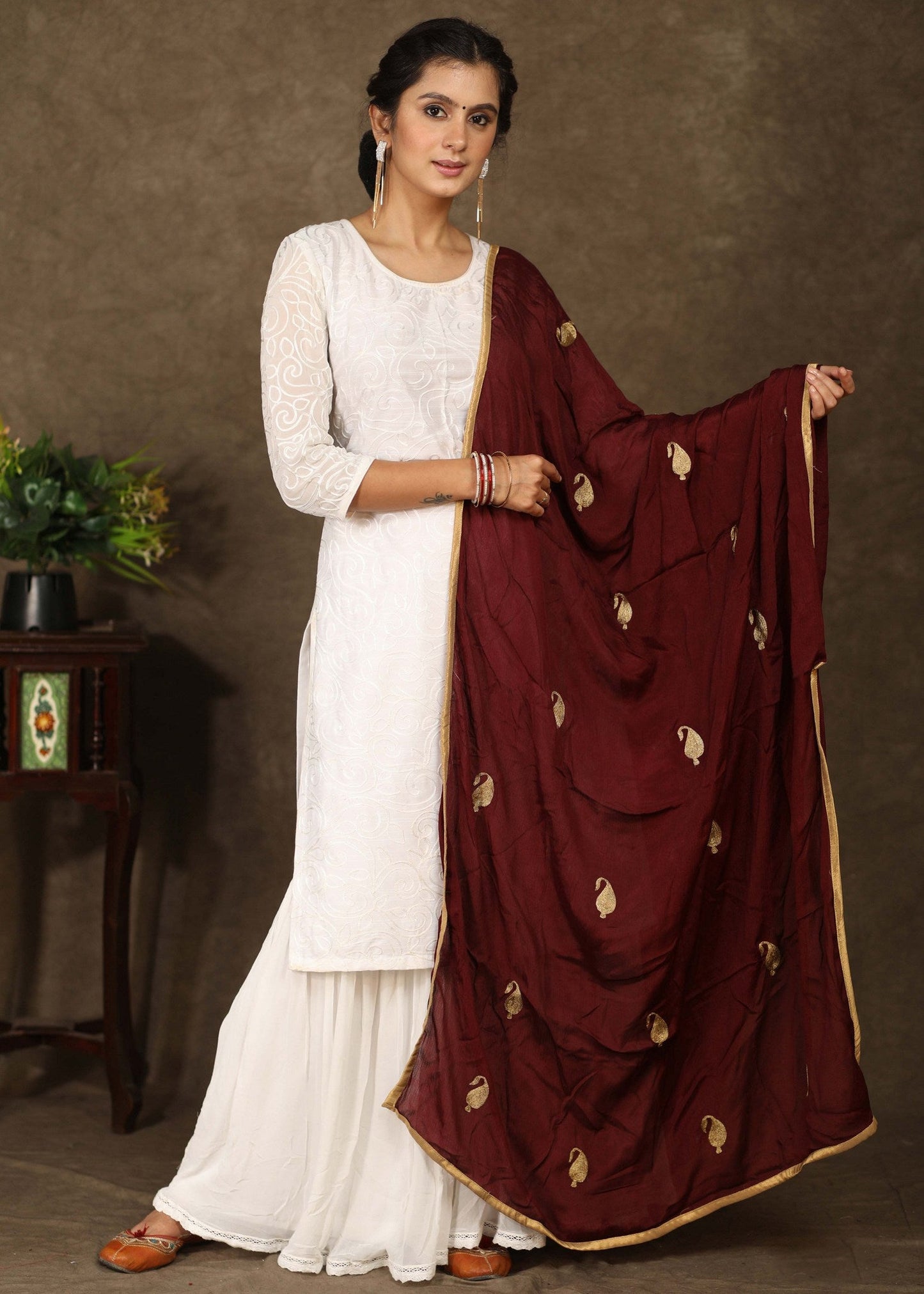 Maroon dupatta with delicate golden embroidery