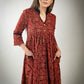 Rust colour printed Ajrakh dress with black detailing & pockets