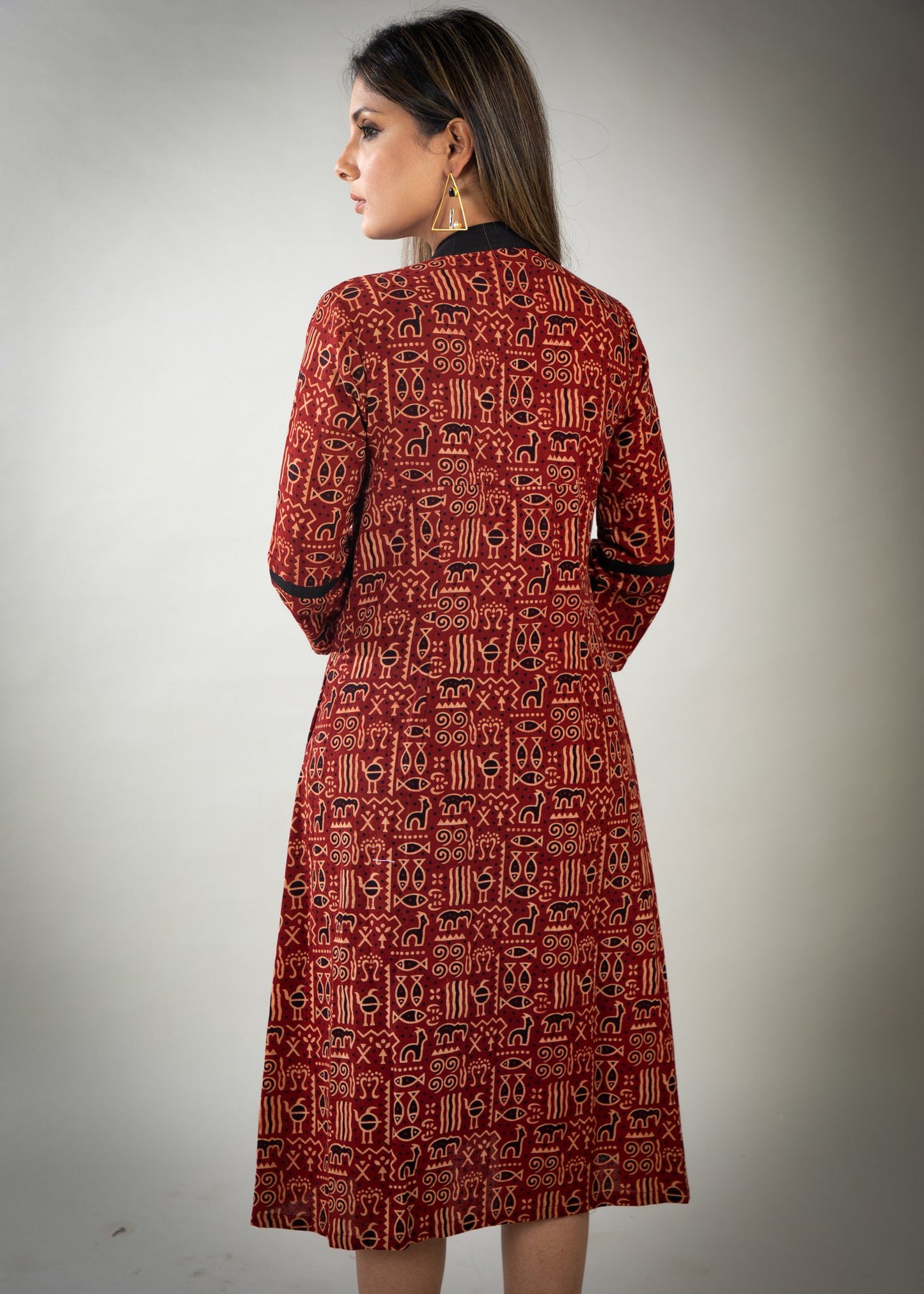 Rust colour printed Ajrakh dress with black detailing & pockets