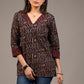 Black animal print Ajrakh pure cotton top with Ikat collar and cuff