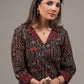 Black animal print Ajrakh pure cotton top with Ikat collar and cuff