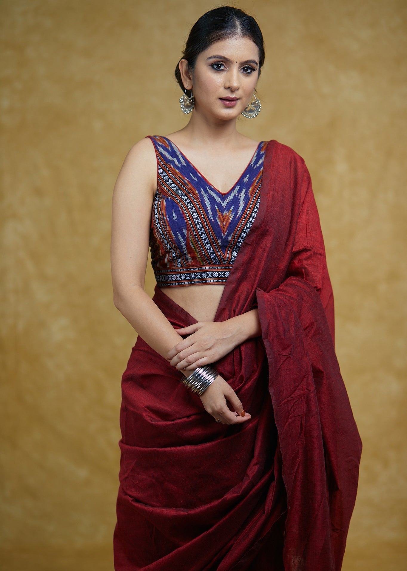 Stylish Blue Cotton Border Ikaat Sleeveless Blouse with Maroon Detailing