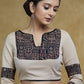 Smart Cream Blouse with Black Ajrakh yoke & Sleeves Highlighted with Black pom-pom Lace