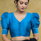 Striking Firozi Blue Puff Sleeves Elbow Length Blouse with Silver Detailing