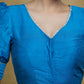 Striking Firozi Blue Puff Sleeves Elbow Length Blouse with Silver Detailing