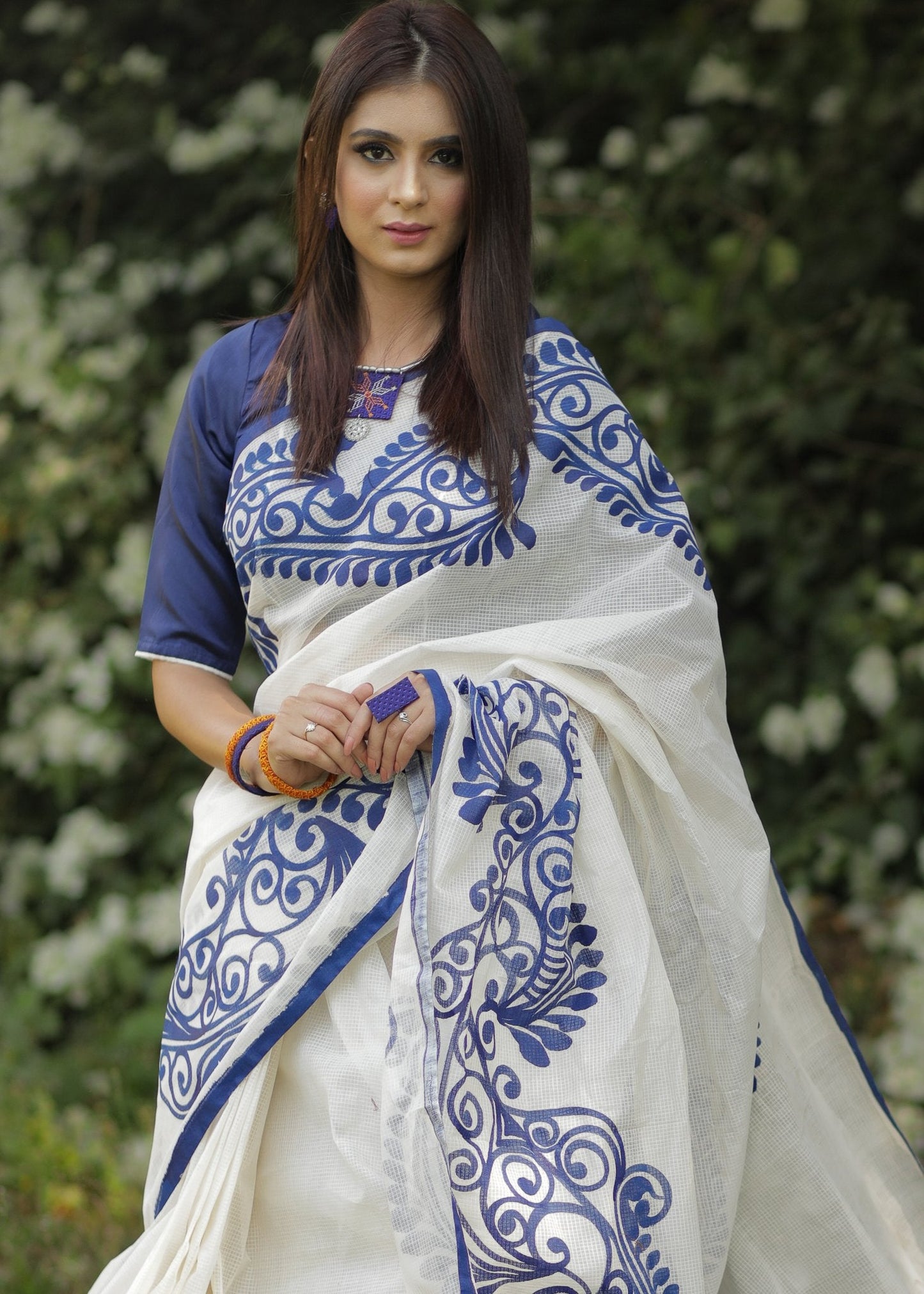 White chanderi saree with hand painted blue alpana