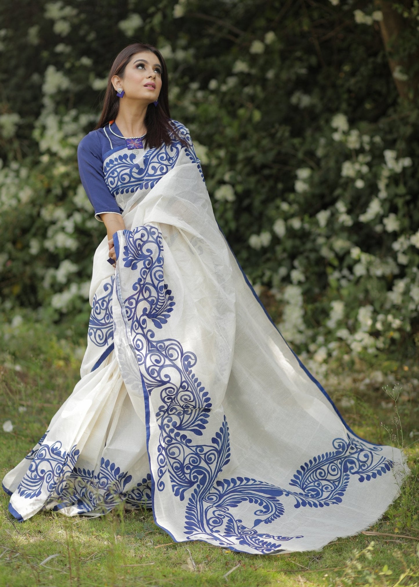 White chanderi saree with hand painted blue alpana