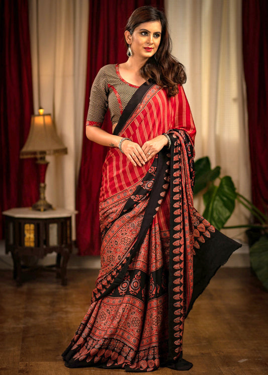 Exclusive block printed maroon modal silk Ajrakh saree