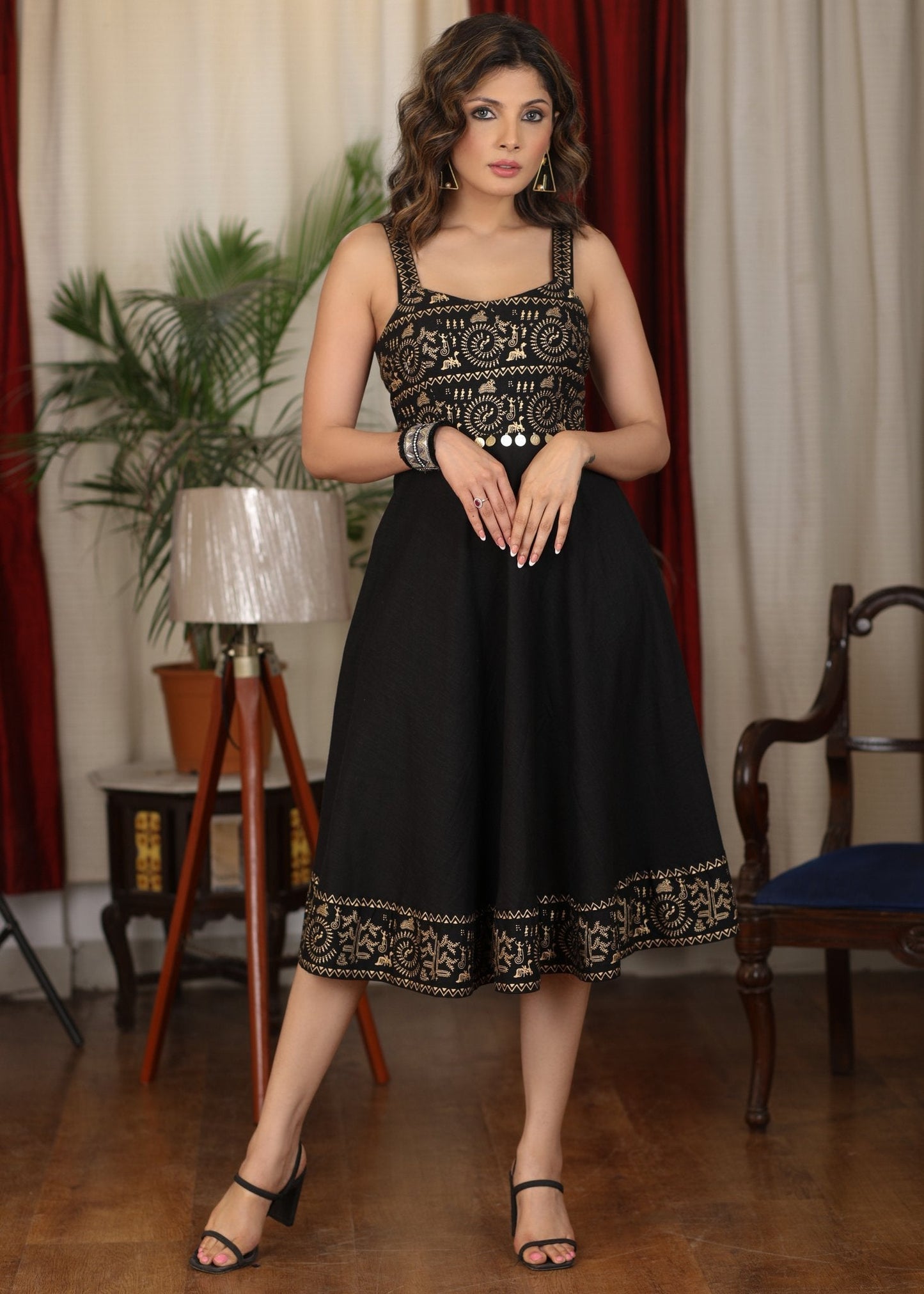 Exquisite black cotton dress with golden foil warli print combination and coin embellishments