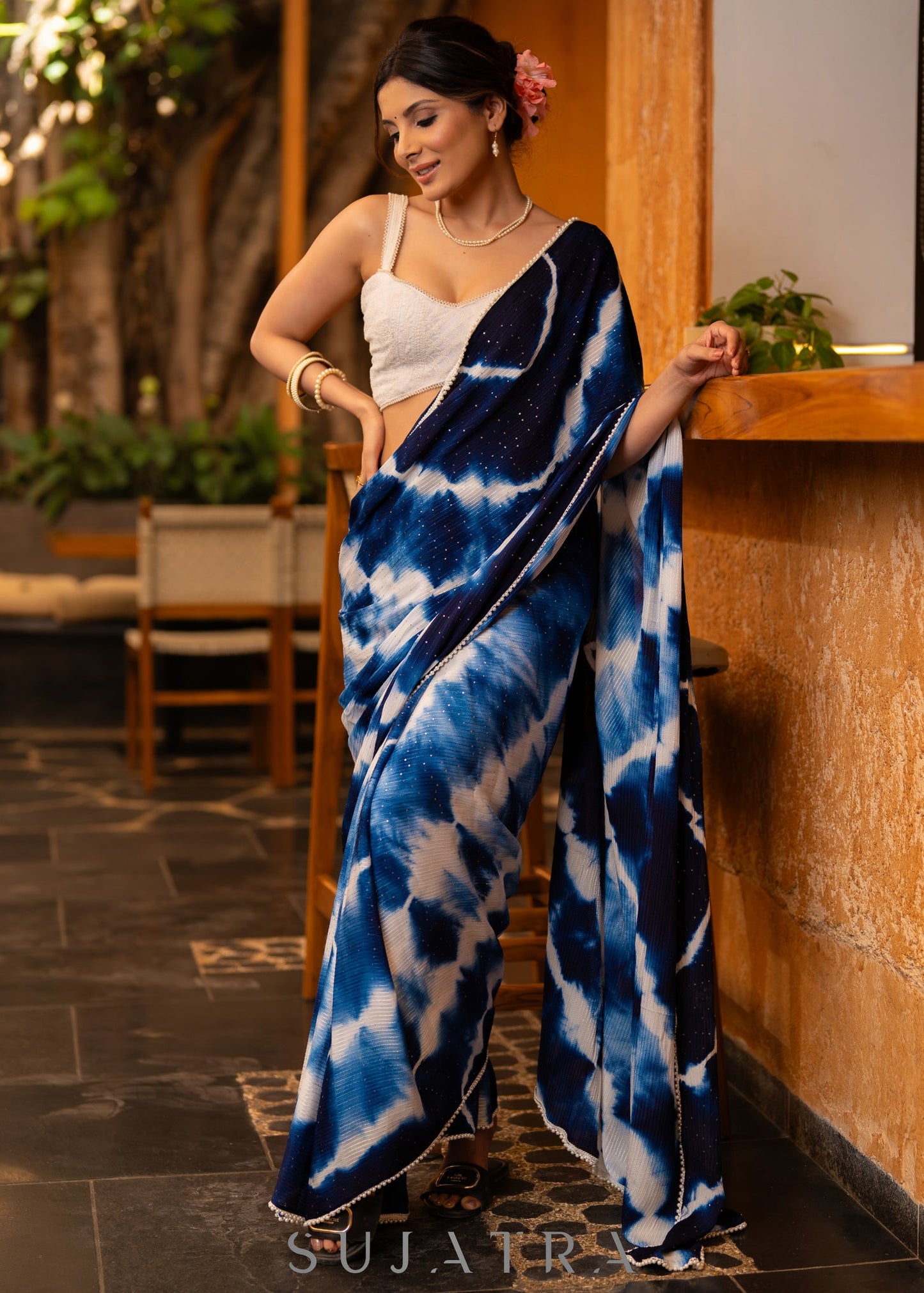 Stylish Navy Blue Shibori Georgette Saree With Beautiful Overall Sequenced Crochet Highlighted With Minimal Pearl Lace