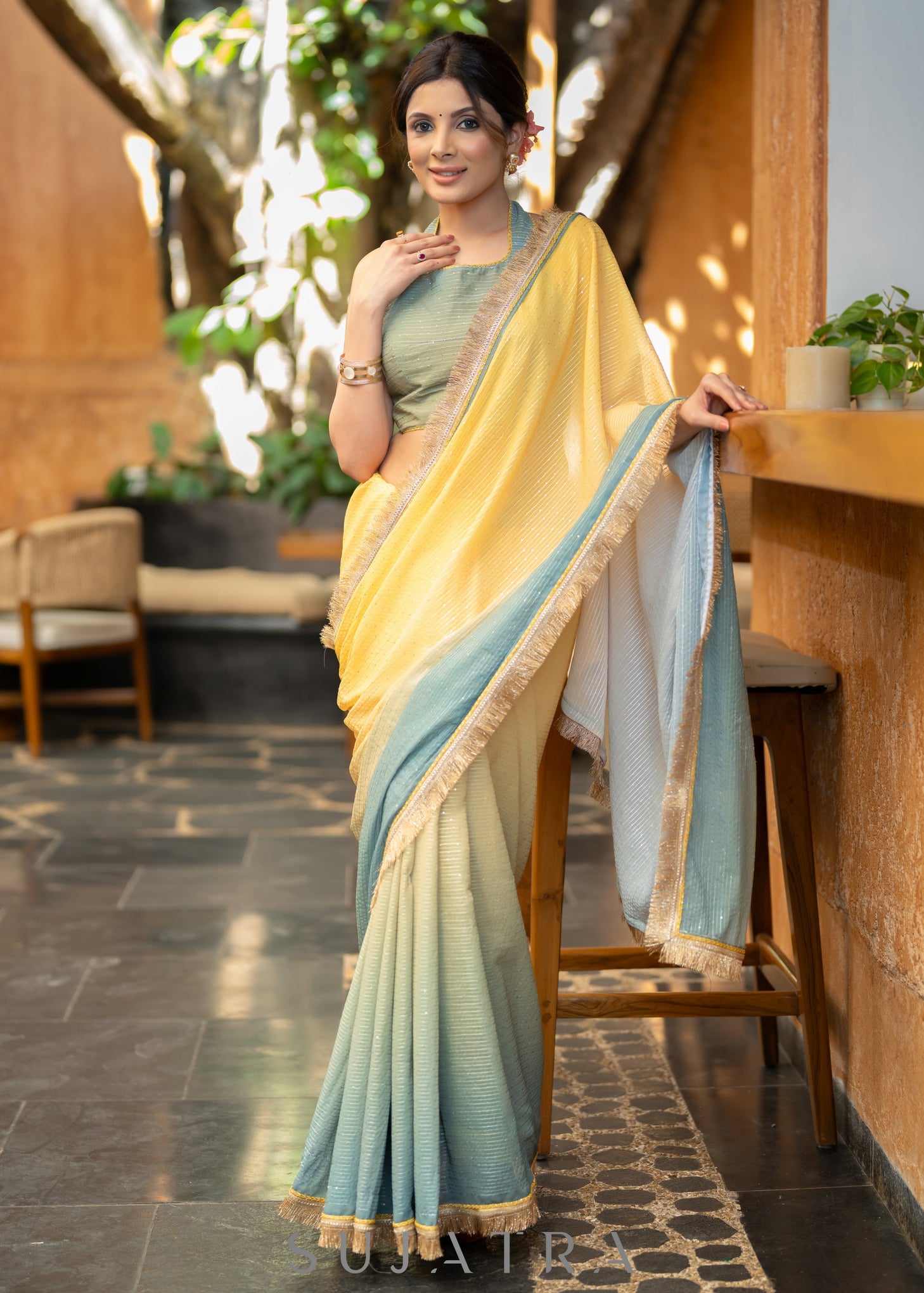 Graceful Yellowish Green Ombre Georgette Saree With Overall Sequenced Crochet Highlighted With Elegant Laces