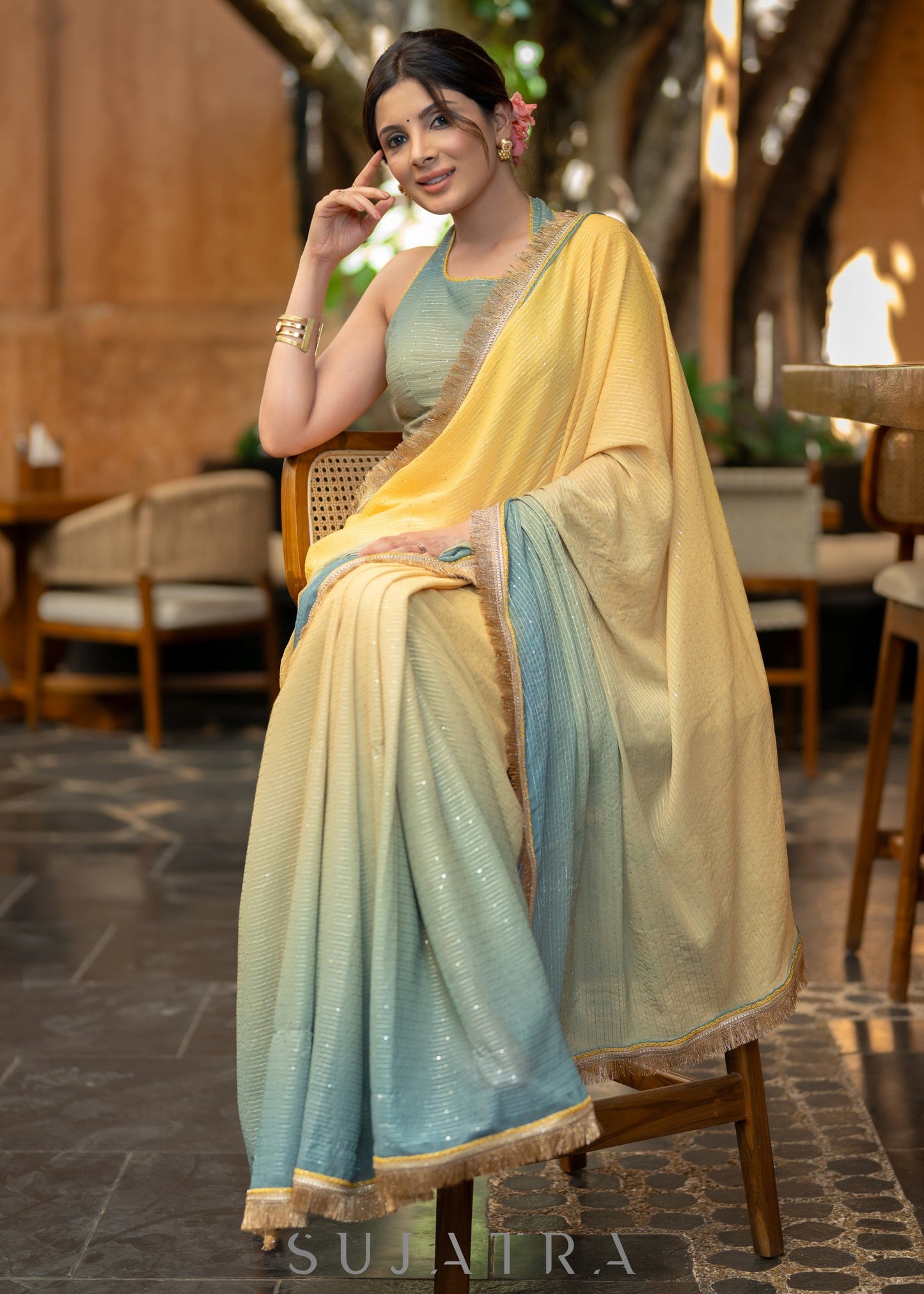 Graceful Yellowish Green Ombre Georgette Saree With Overall Sequenced Crochet Highlighted With Elegant Laces