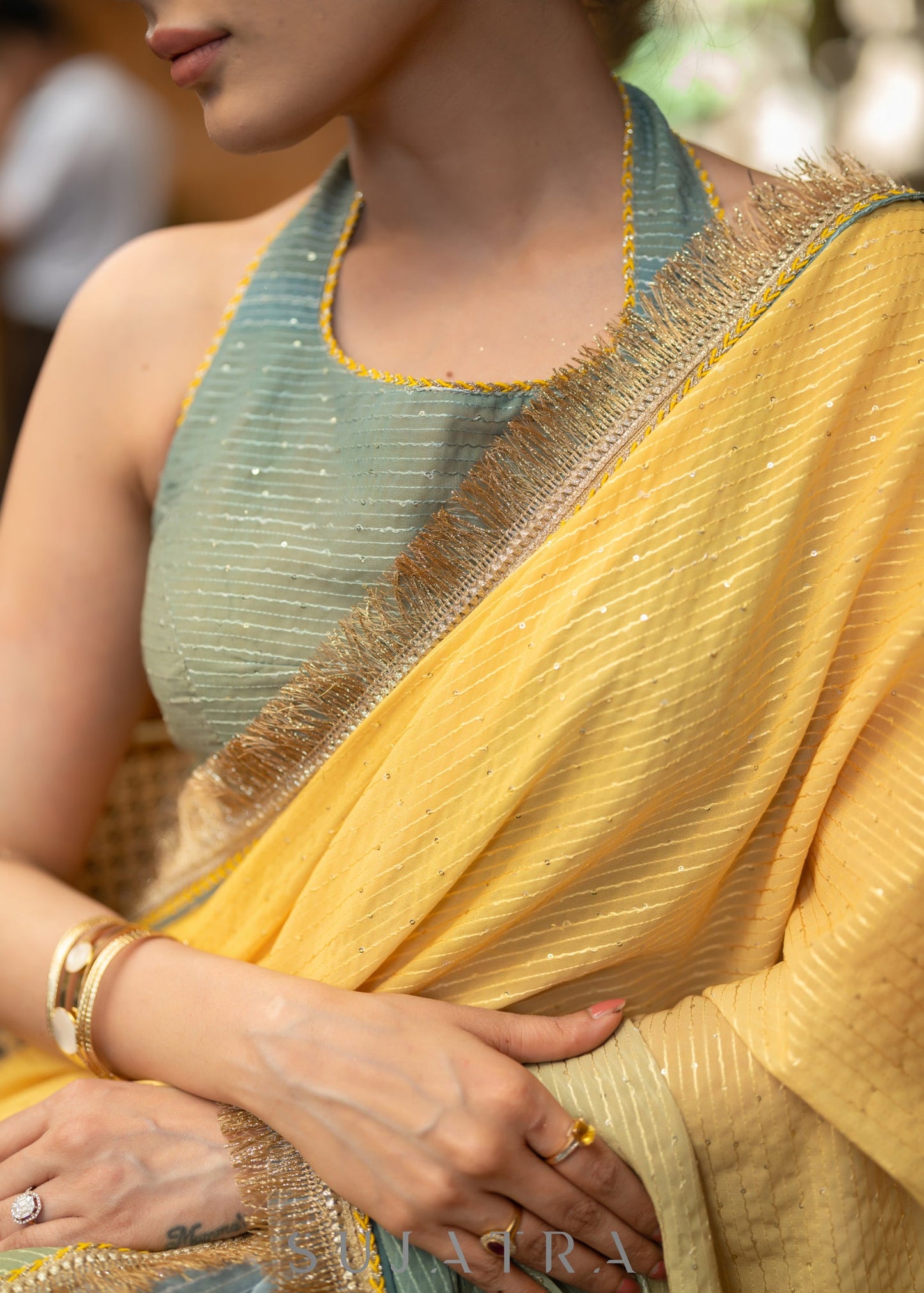 Graceful Yellowish Green Ombre Georgette Saree With Overall Sequenced Crochet Highlighted With Elegant Laces