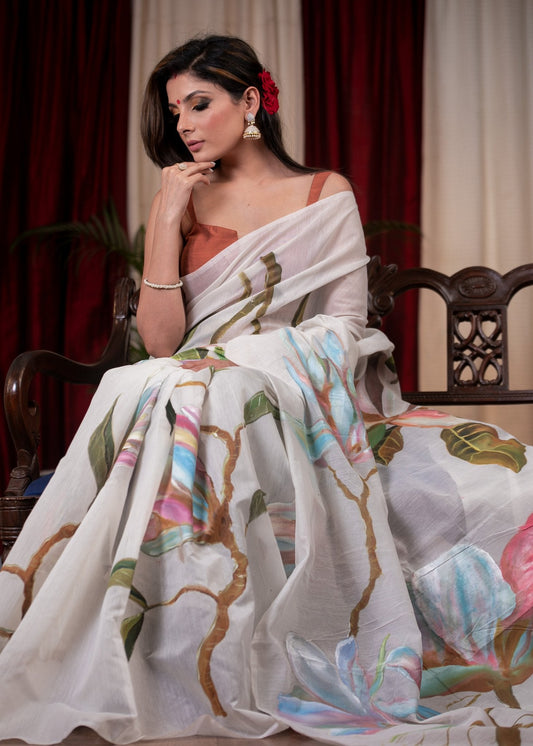 Exclusive hand painted white chanderi saree with floral motifs