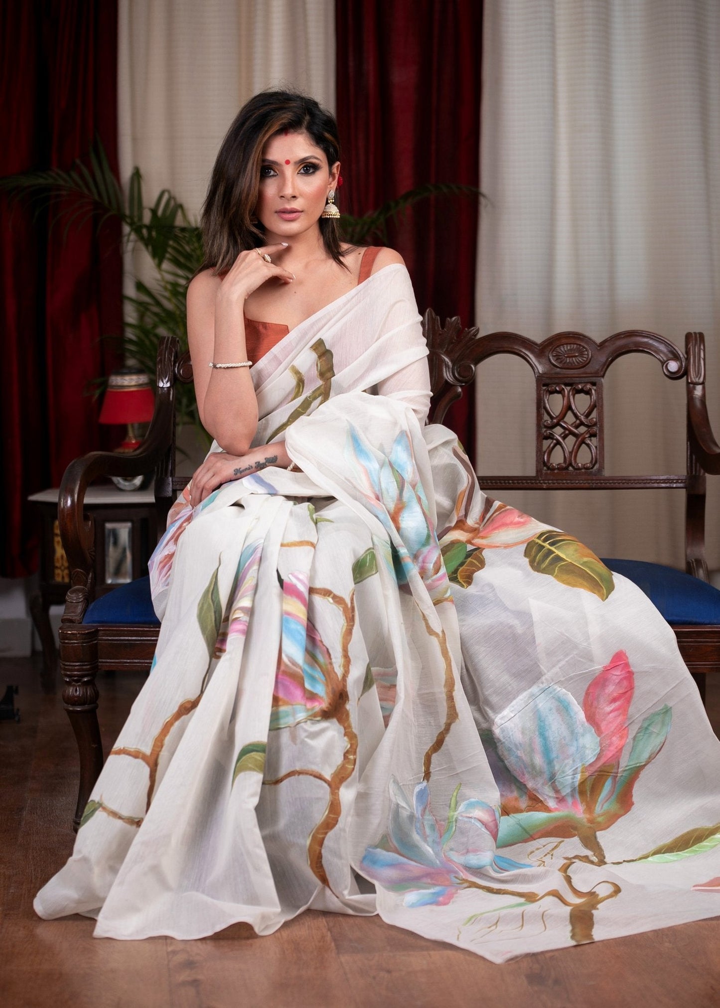 Exclusive hand painted white chanderi saree with floral motifs