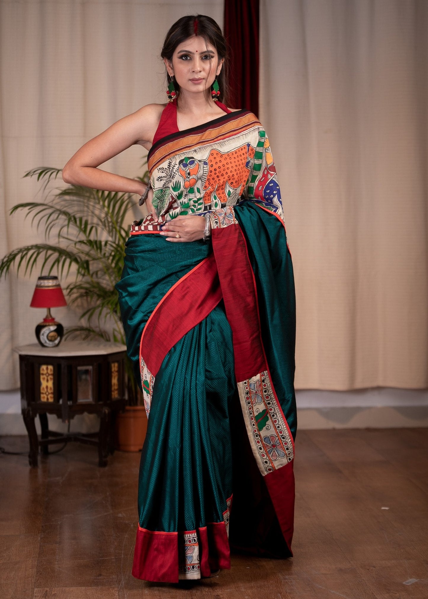 Teal khun saree with hand painted Madhubani border