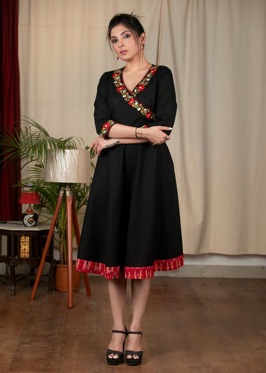 Exclusive black cotton dress with embroidered motifs