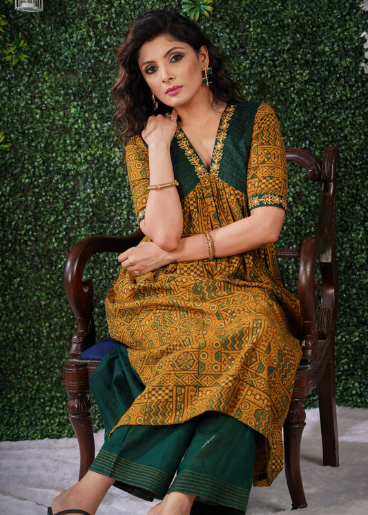 Mustard Ajrakh Cotton Kurta with embroidery on sleeves & Neckline .