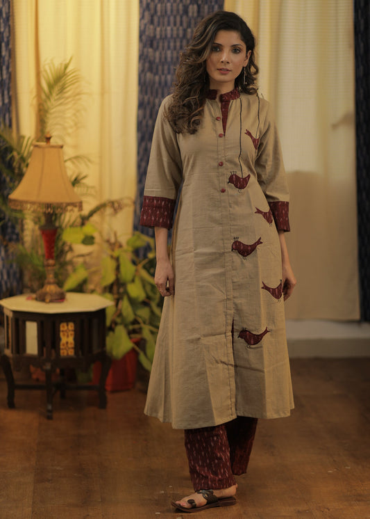 A-line Handloom Cotton kurta with exclusive Hand Cut Ikat Birds and Embroidery.