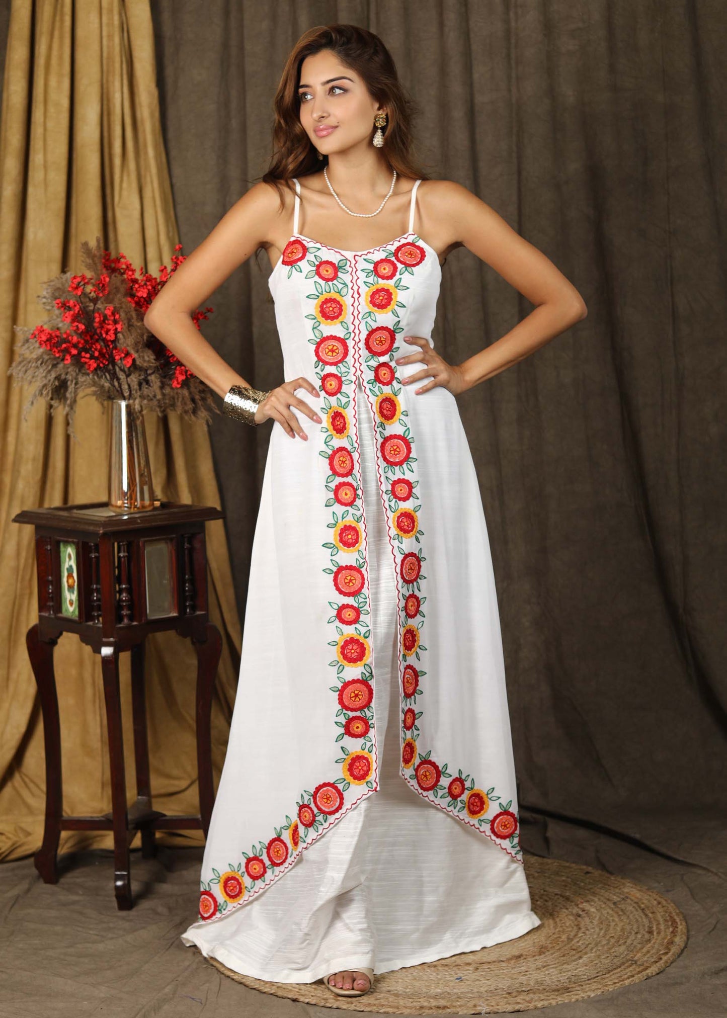 Classy white boho inspired strappy maxi dress with floral embroidery on front layer with optional georgette shrug