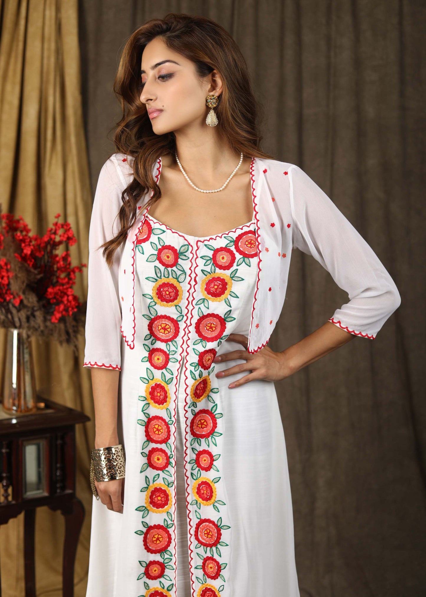 Classy white boho inspired strappy maxi dress with floral embroidery on front layer with optional georgette shrug