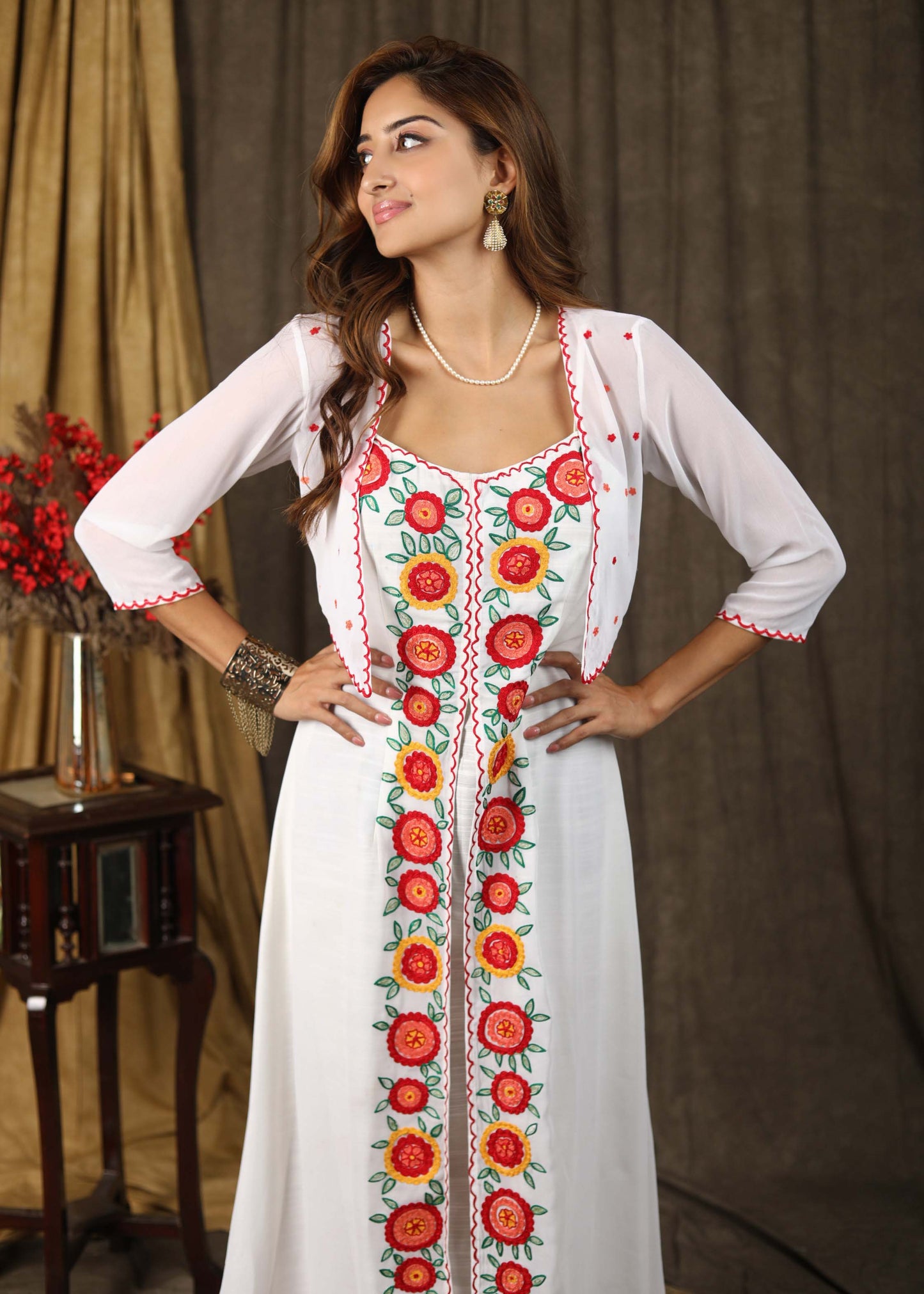 Classy white boho inspired strappy maxi dress with floral embroidery on front layer with optional georgette shrug