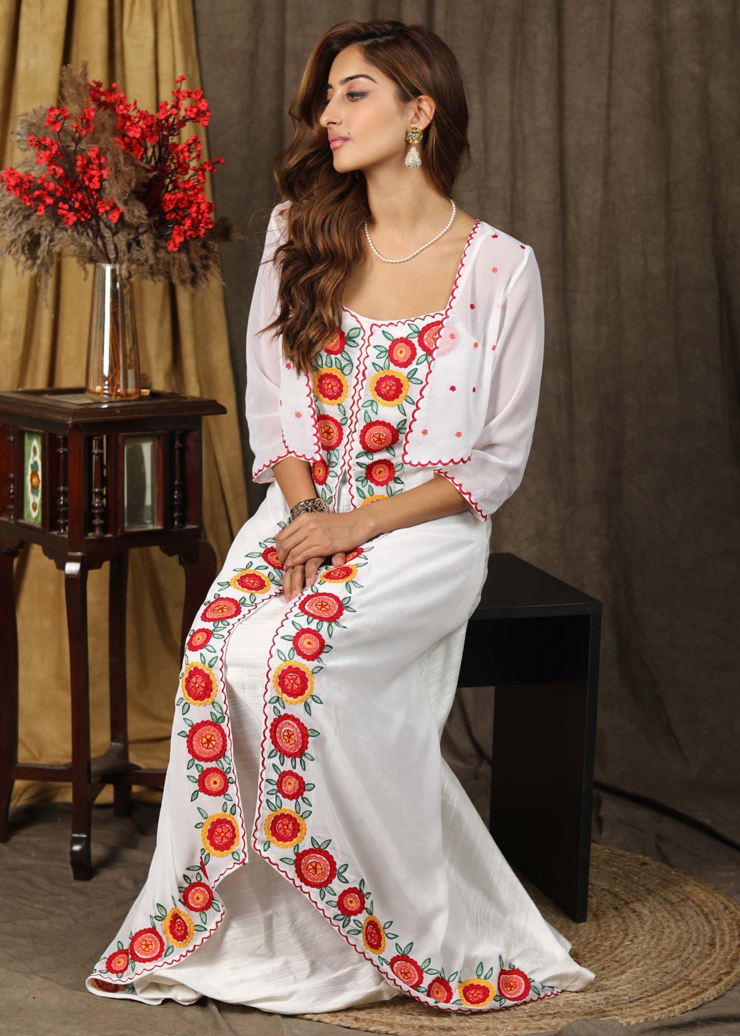 Classy white boho inspired strappy maxi dress with floral embroidery on front layer with optional georgette shrug