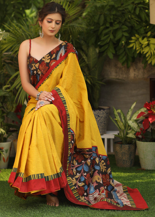 Surreal yellow Cotton saree with Handcrafted Kalamkari Pallu and border