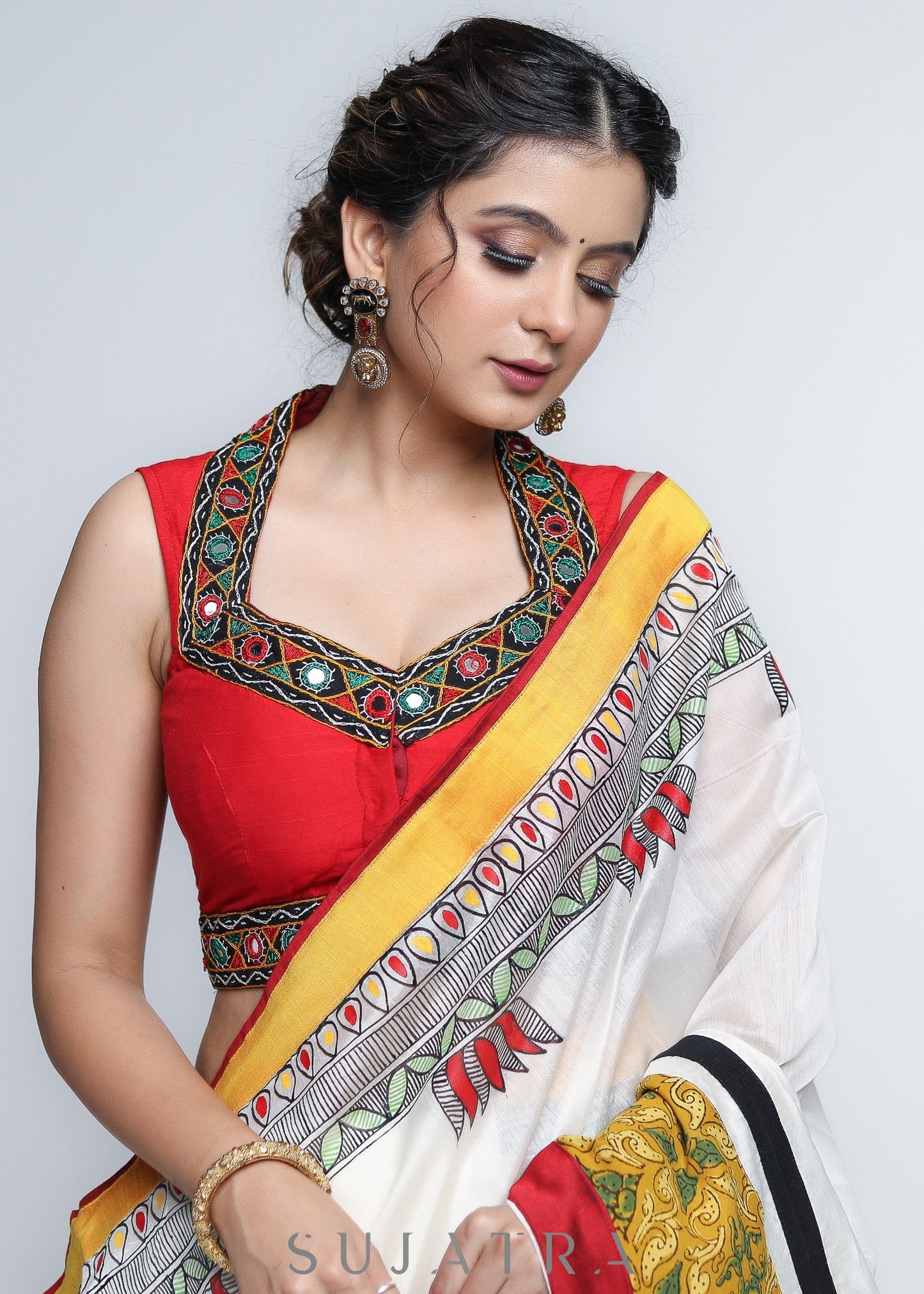 Stylish White Chanderi Saree with Mustard Ajrakh Border & Gond Painting Detailing