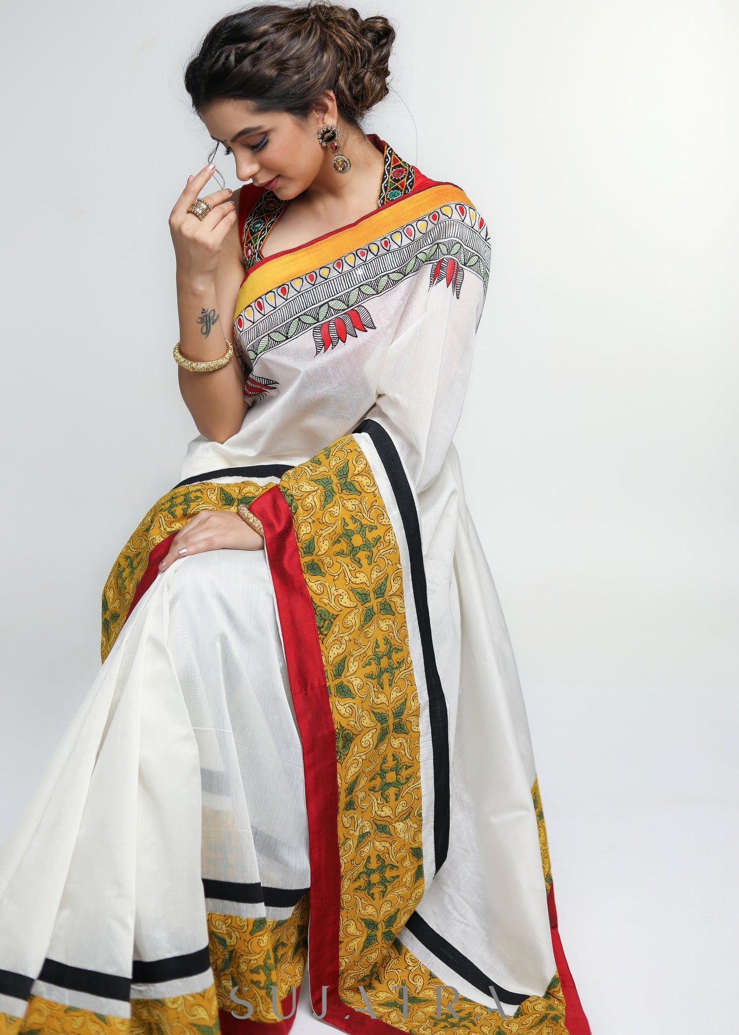 Stylish White Chanderi Saree with Mustard Ajrakh Border & Gond Painting Detailing