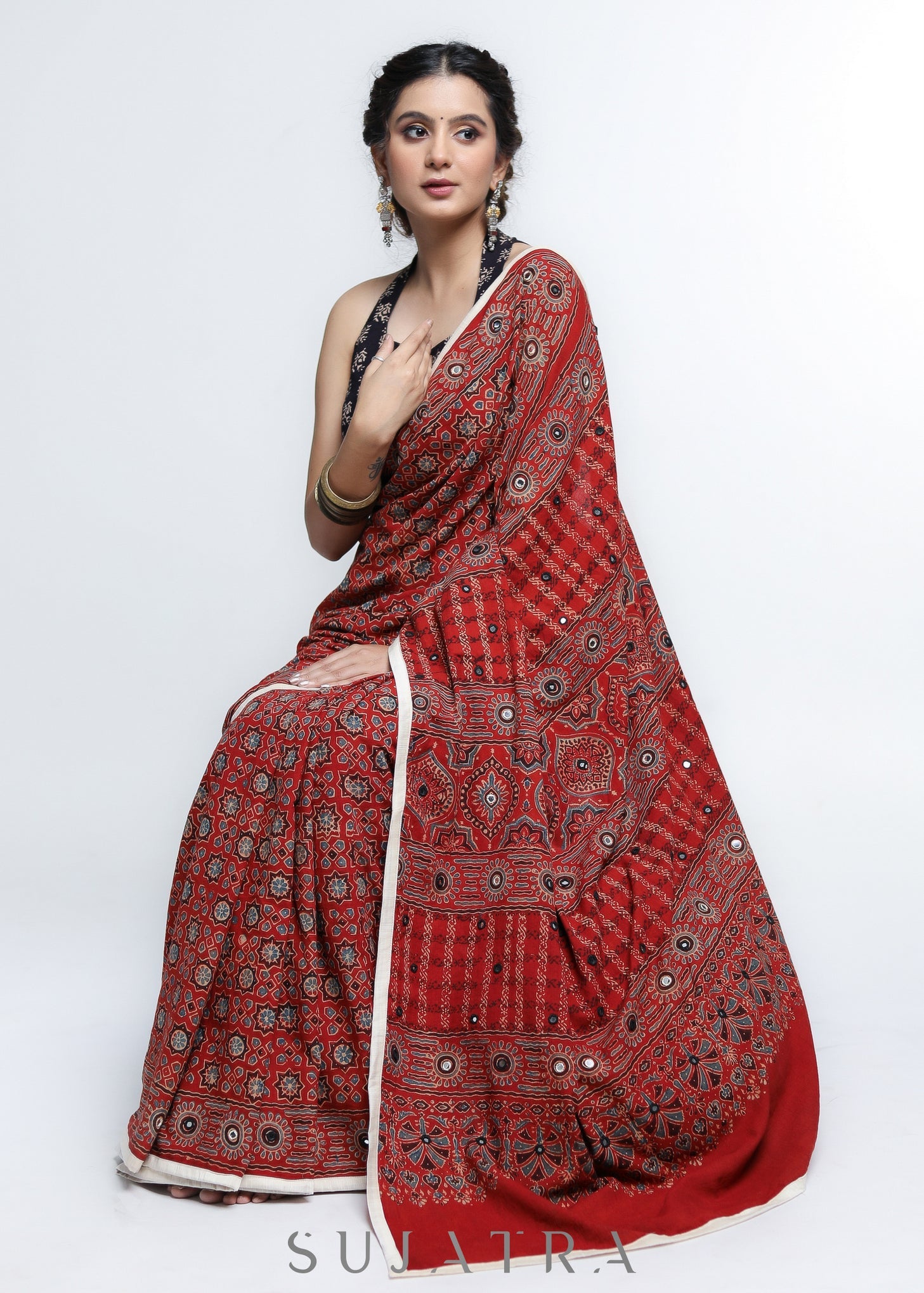 Stunning Red Ajrakh Saree with Mirrorwork detailing & White Border