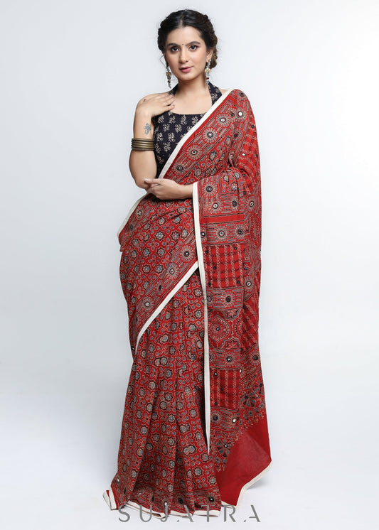 Stunning Red Ajrakh Saree with Mirrorwork detailing & White Border