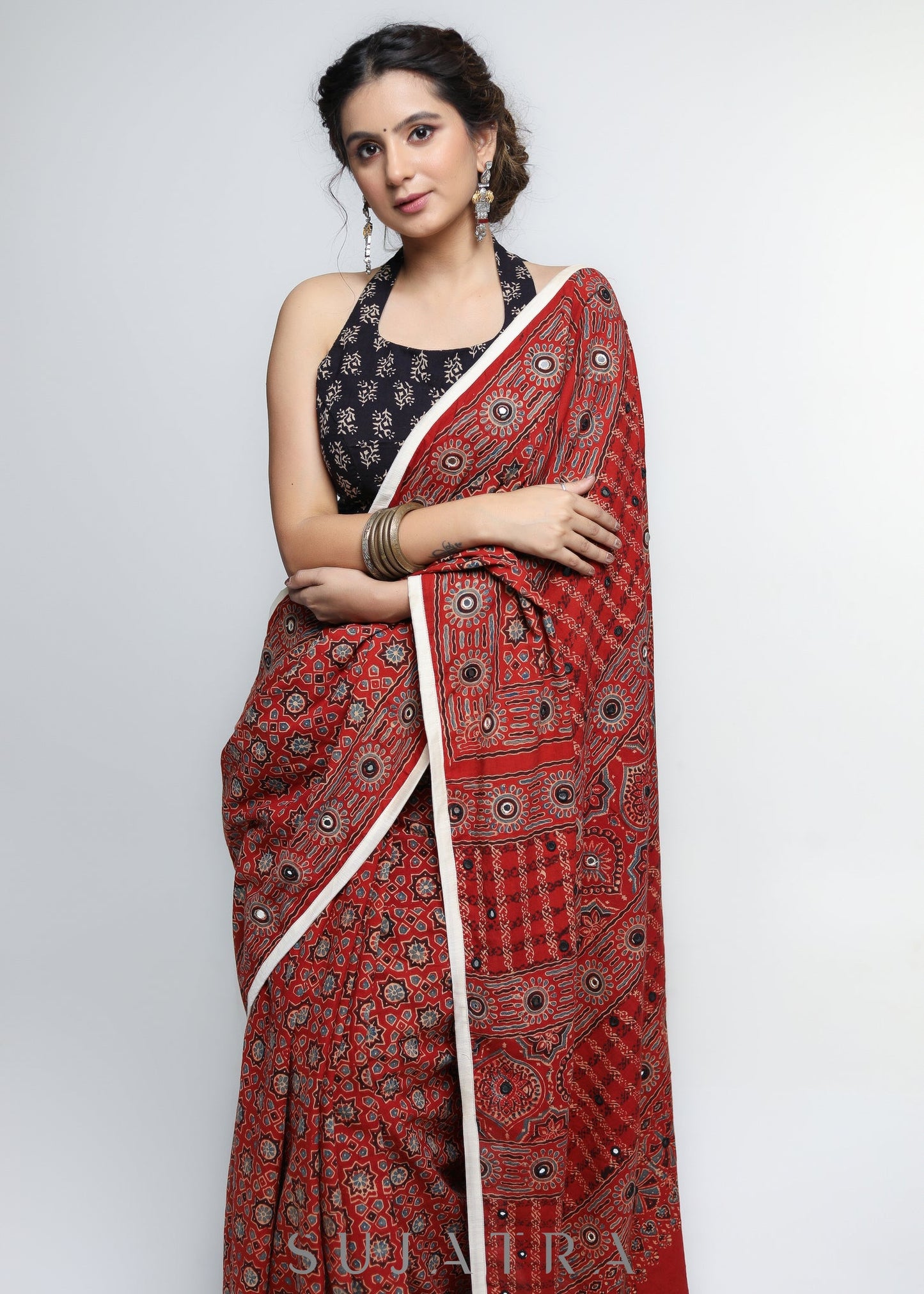 Stunning Red Ajrakh Saree with Mirrorwork detailing & White Border