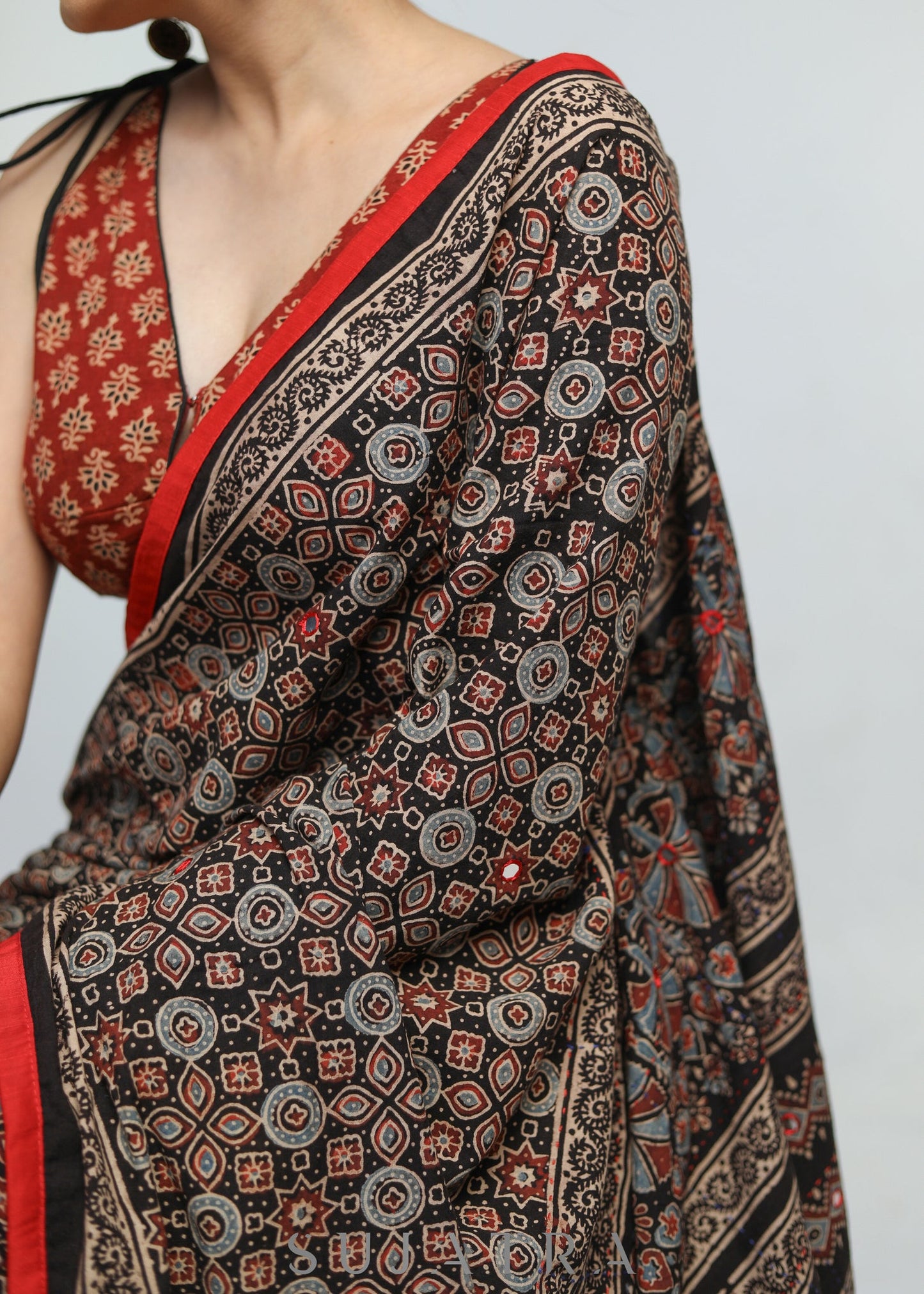 Gorgeous Black Ajrakh Cotton Saree with Red Border