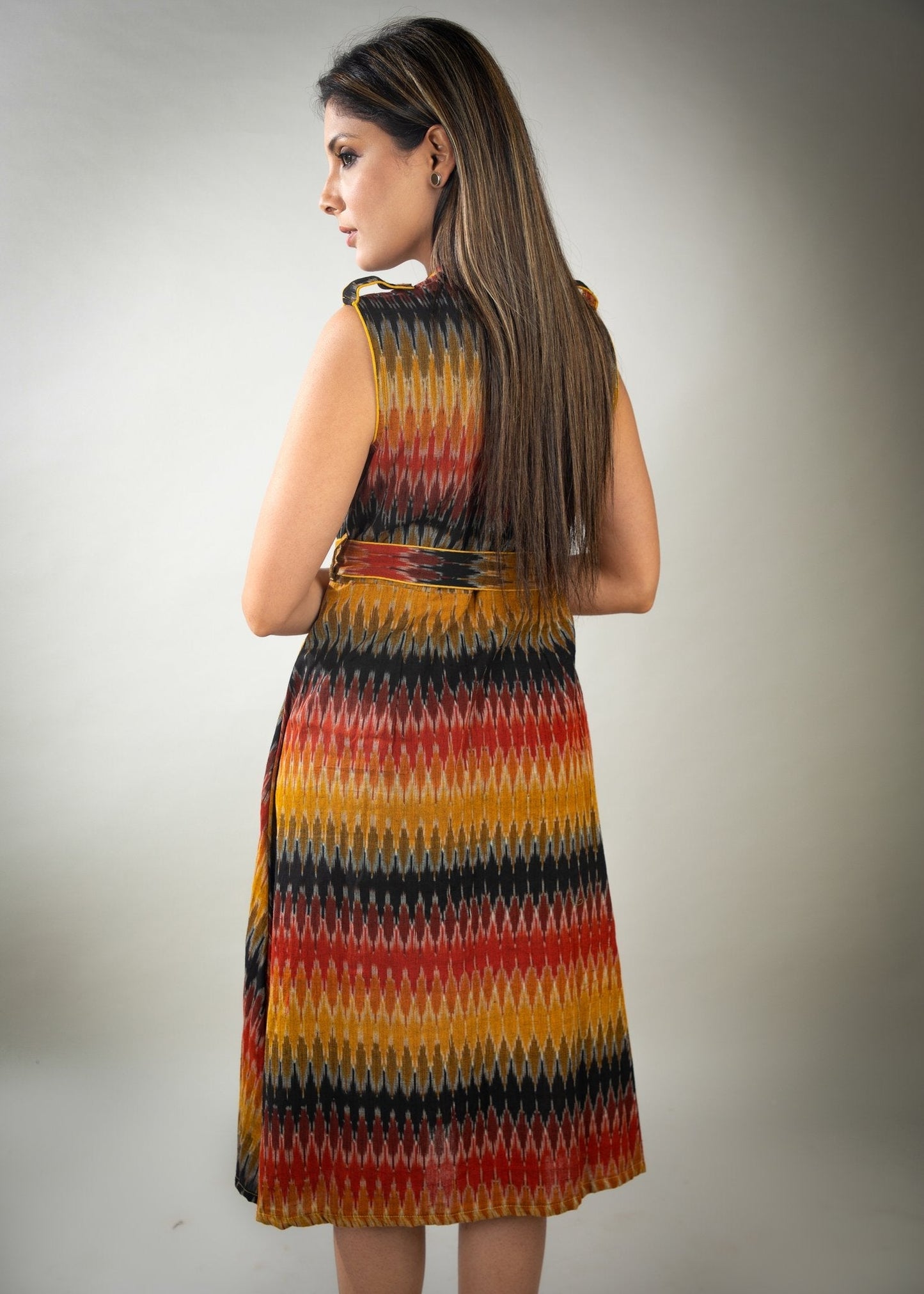 Striped mustard & black ikat dress with asymmetrical front panel cut