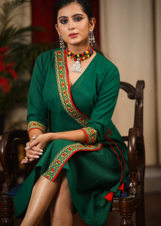 Exclusive green dress with authentic hand embroidered mirror work